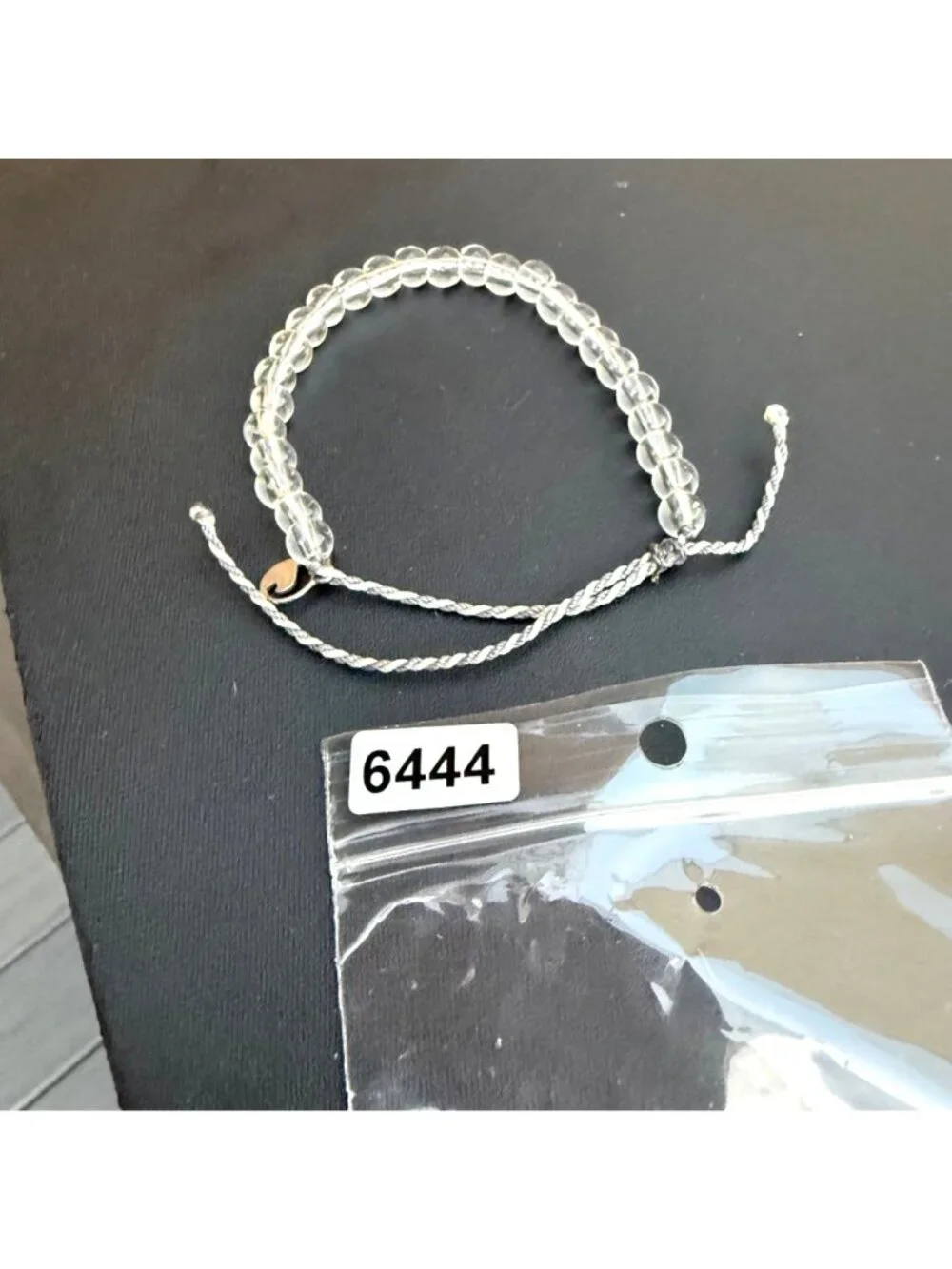 4ocean Bracelet Clear Glass Beaded Wave Charm Braided Adjustable Cord